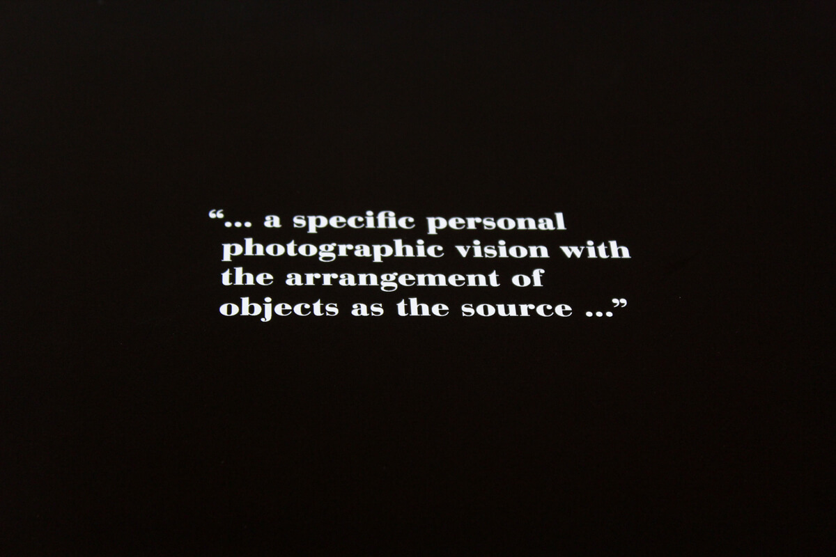 Quote from Barbara Kasten stating '... a specific personal photographic vision of the arrangements of objects as the source....'